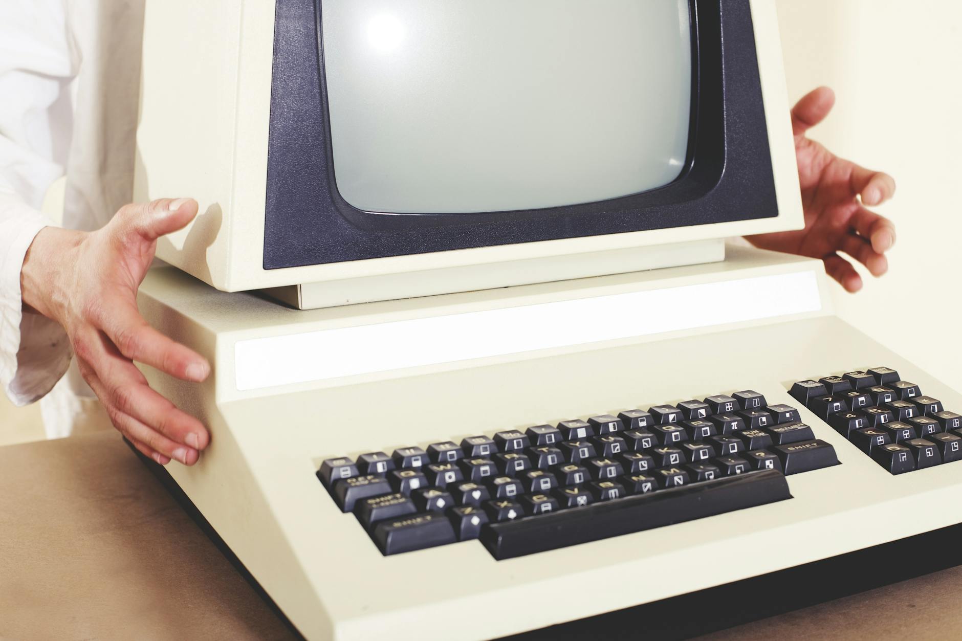 turned off vintage white and black computer