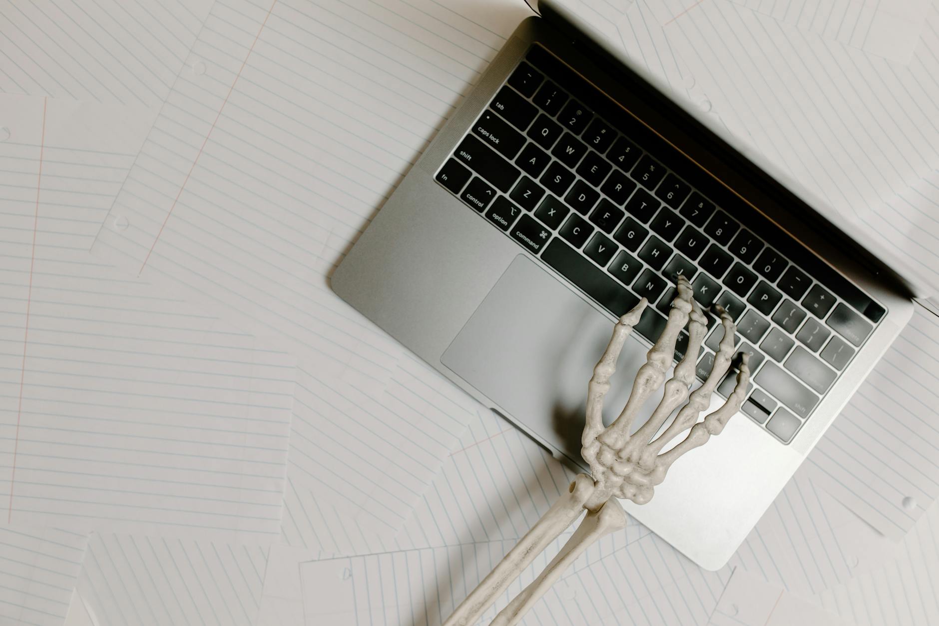 macbook pro on white table