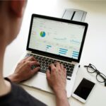 The Ultimate Guide to Accounting Software on Linux (2025) person using MacBook Pro