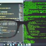 black framed eyeglasses on computer screen