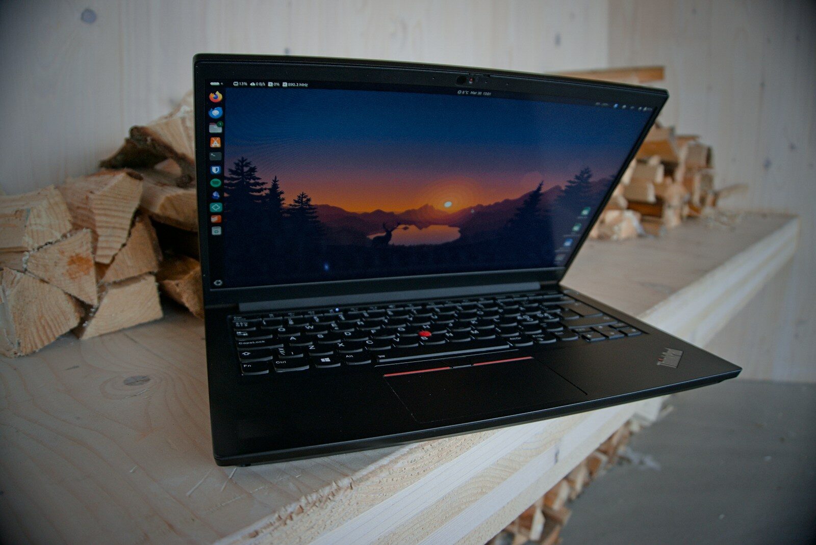A laptop displaying a beautiful sunset.